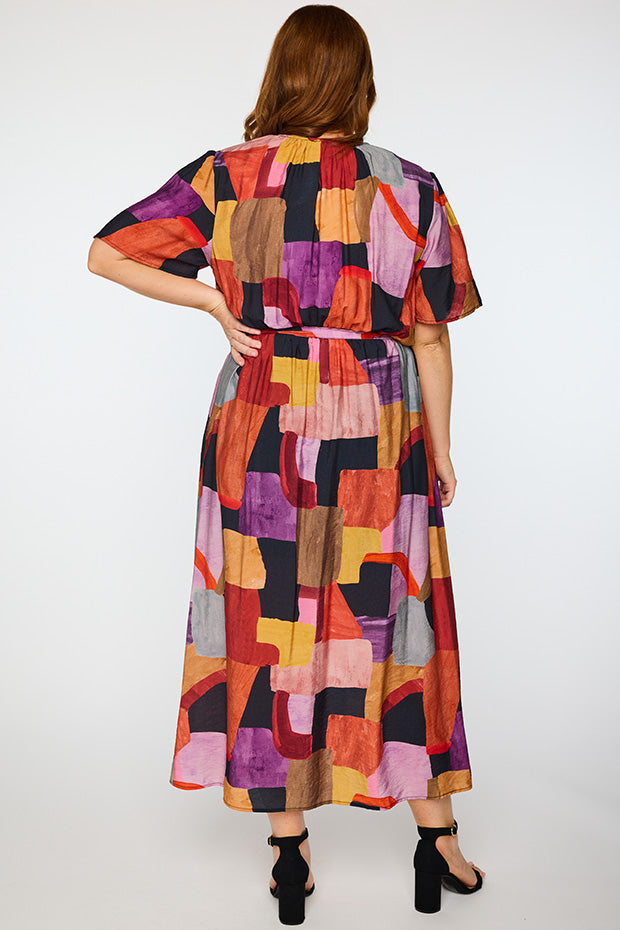 Ebony Geo Sunset Dress โ Geo Sunset midi dress