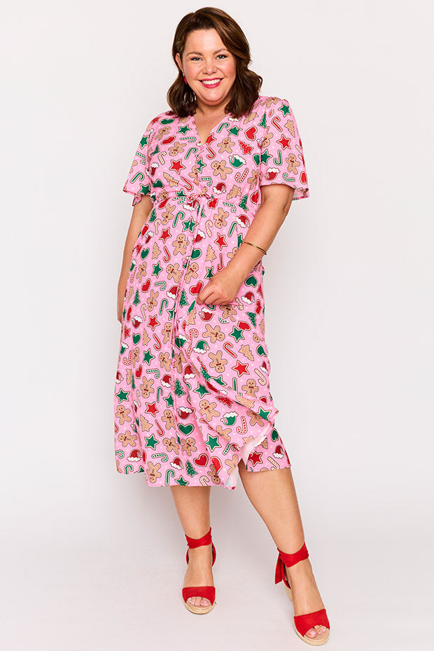 Marley Pink Gingerbread Cookie Christmas Dress โ Pink Gingerbread Cookie Christmas midi dress