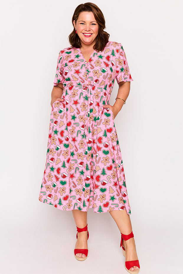 Marley Pink Gingerbread Cookie Christmas Dress โ Pink Gingerbread Cookie Christmas midi dress
