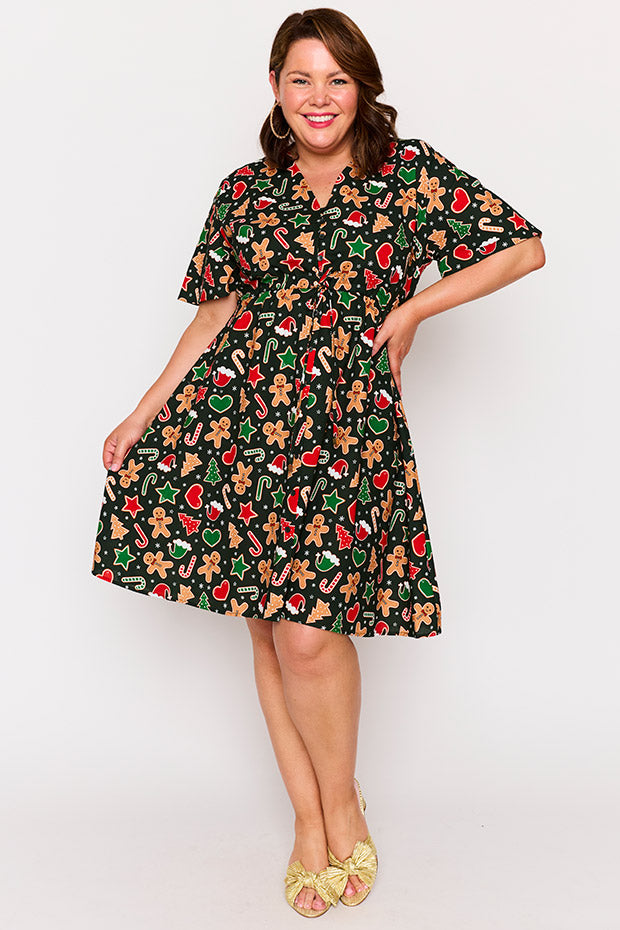 Siena Cotton Gingerbread Cookie Christmas Dress โ Gingerbread Cookie Christmas knee length dress