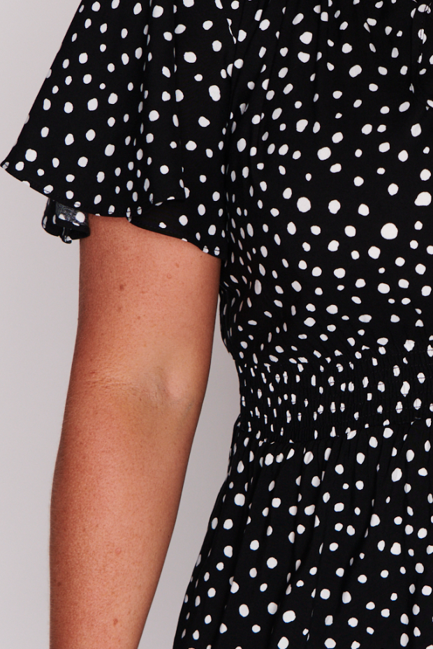 Kimberley Black Irregular Spot Dress โ Black Irregular Spot skater dress