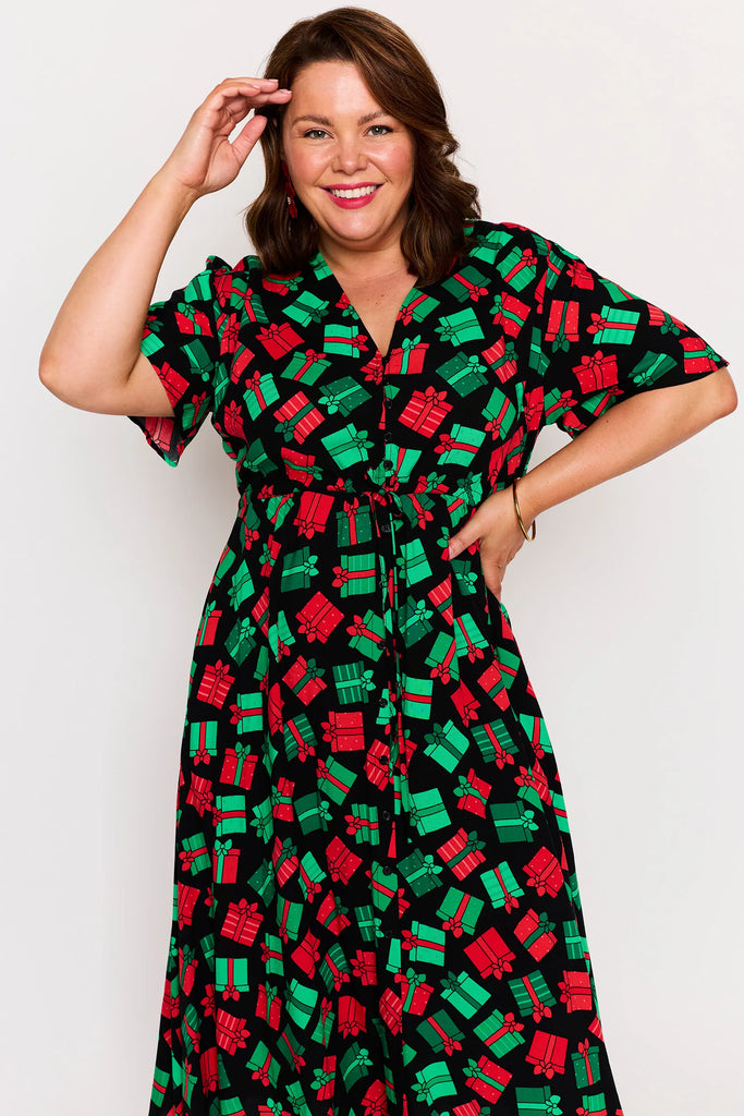 Close-up - Sleeve Detail – Michelle dress in Christmas Presents print, red and green presents pattern