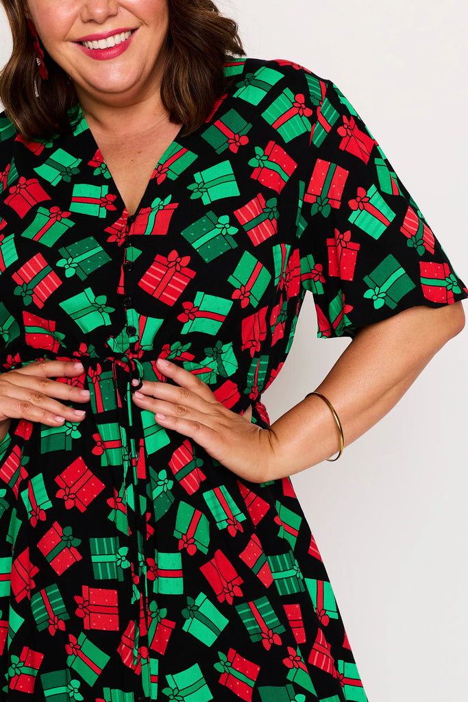 Macro Print Close-Up – Michelle dress in Christmas Presents print, red and green presents pattern
