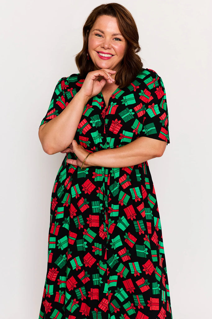 Close-up - Print Detail – Michelle dress in Christmas Presents print, red and green presents pattern